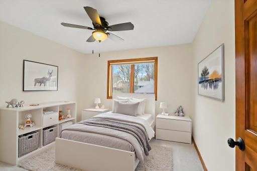 Upper level bedroom 4 (virtually staged).