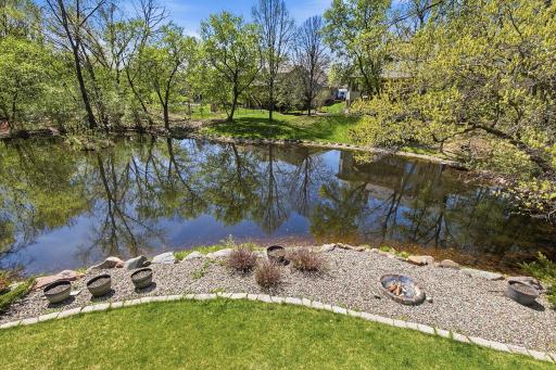 Clear the snow in the winter to create your own skating pond, and cozy up around the in-ground firepit!