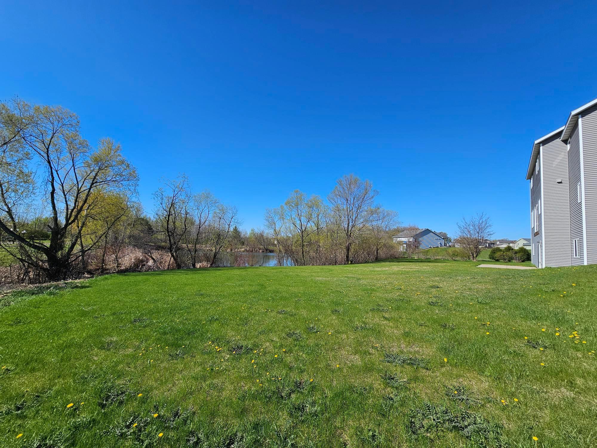This oversized lot features surrounding nature right from your backyard. Enjoy an evening outdoors with your friends and family.