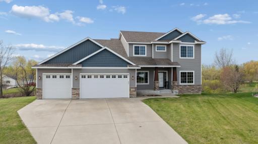 Stunning custom-built two-story home offering 5 bedrooms and 4 bathrooms, perfectly positioned on an oversized cul-de-sac lot at the most desirable end of the street.