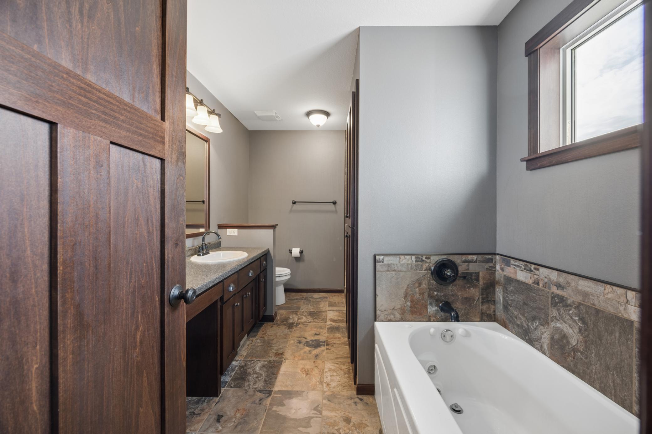 Separate shower and jetted tub