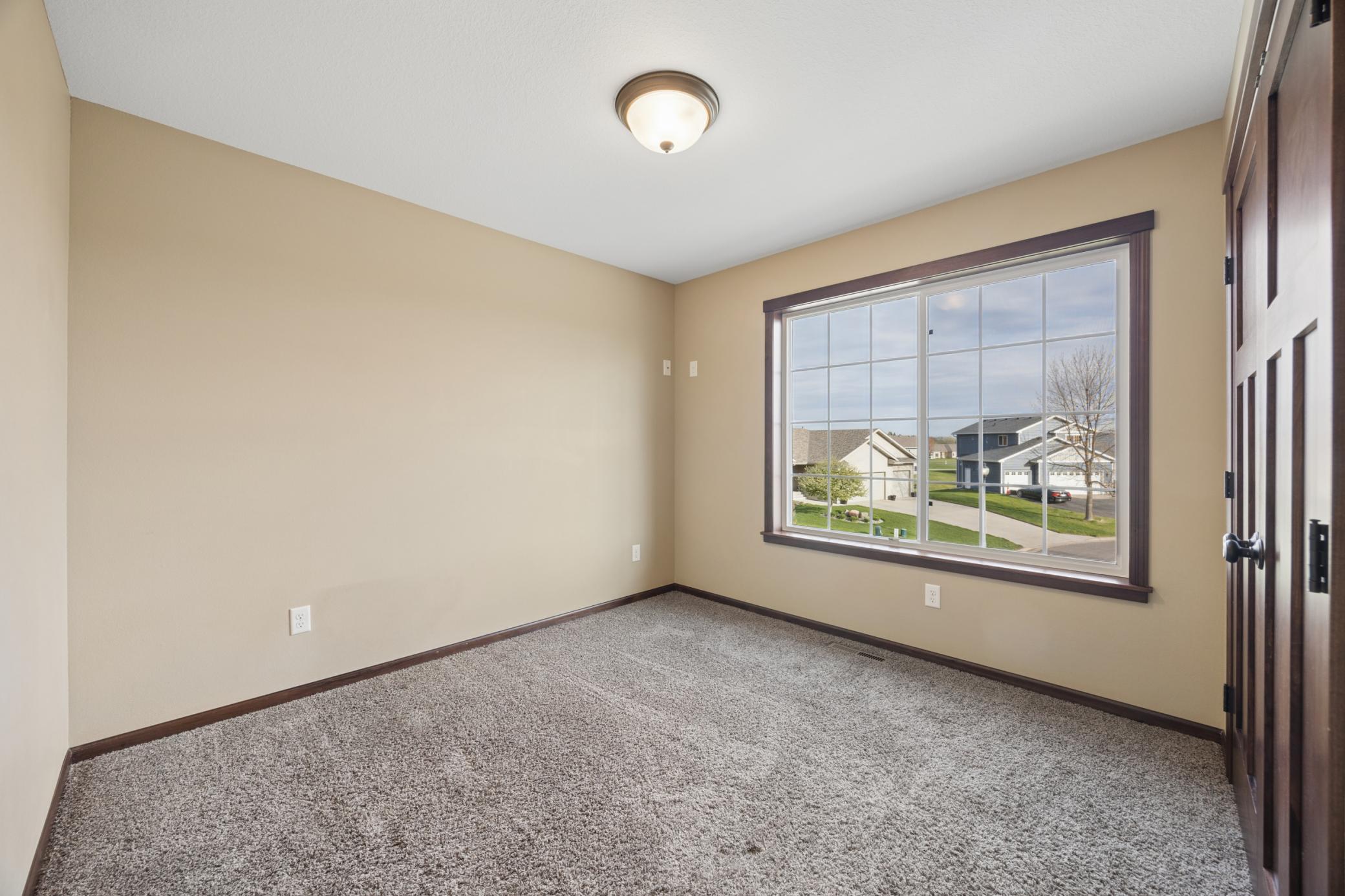 One of the 4 bedrooms on the upper level