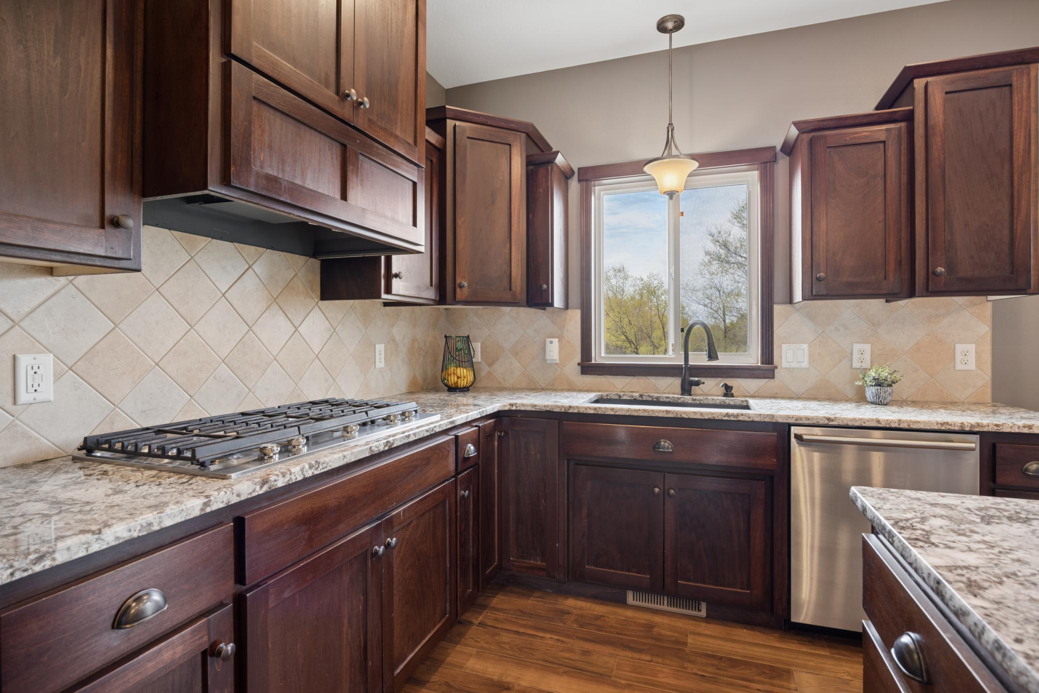 Window over the kitchen sink allows natural light in