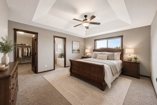 Virtual staged-Generously sized primary suite designed as a true retreat. Enjoy the elegance of a tray ceiling and a lighted ceiling fan.