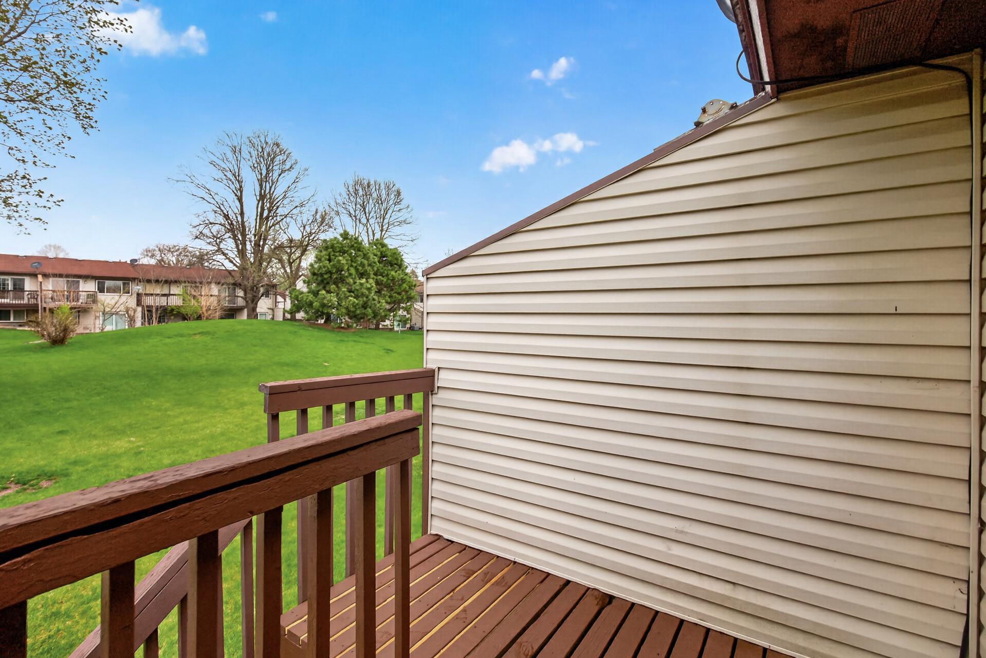 deck over looks beautiful green grass