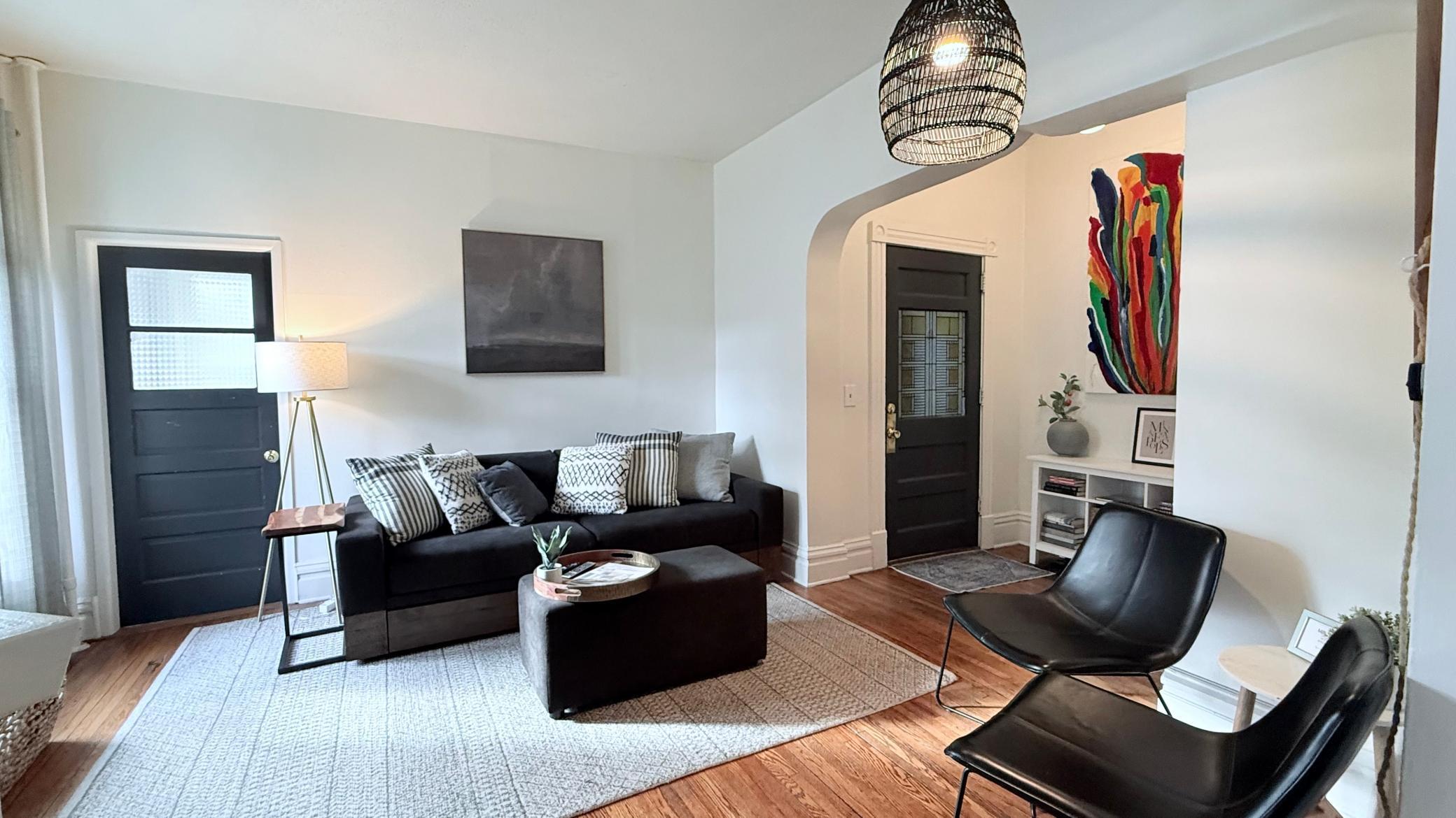 Airbnb Unit showing side entrance and foyer. Couch pulls out for additional bed