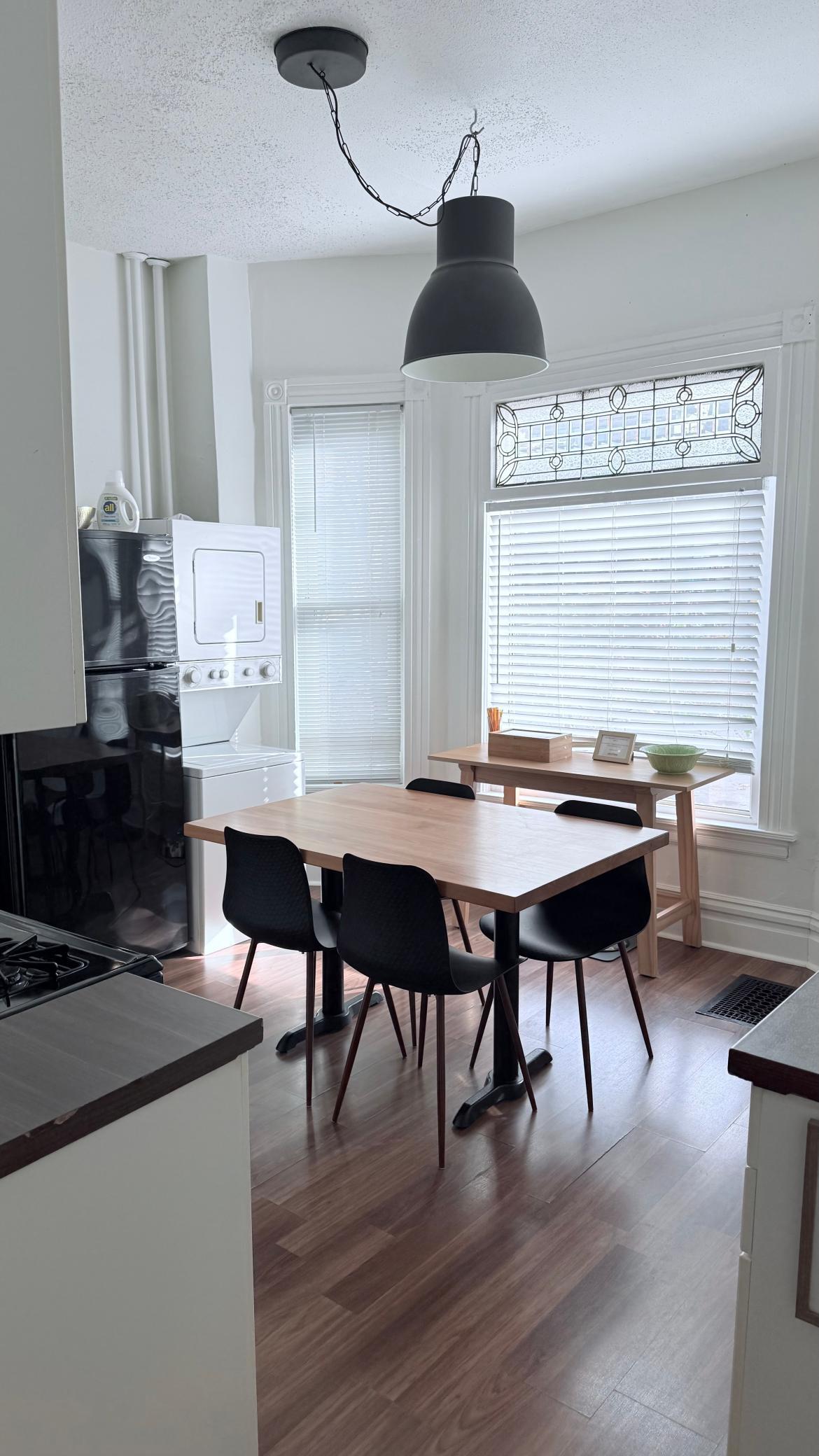 Airbnb unit kitchen, original stain glass windows, washer dryer in unit