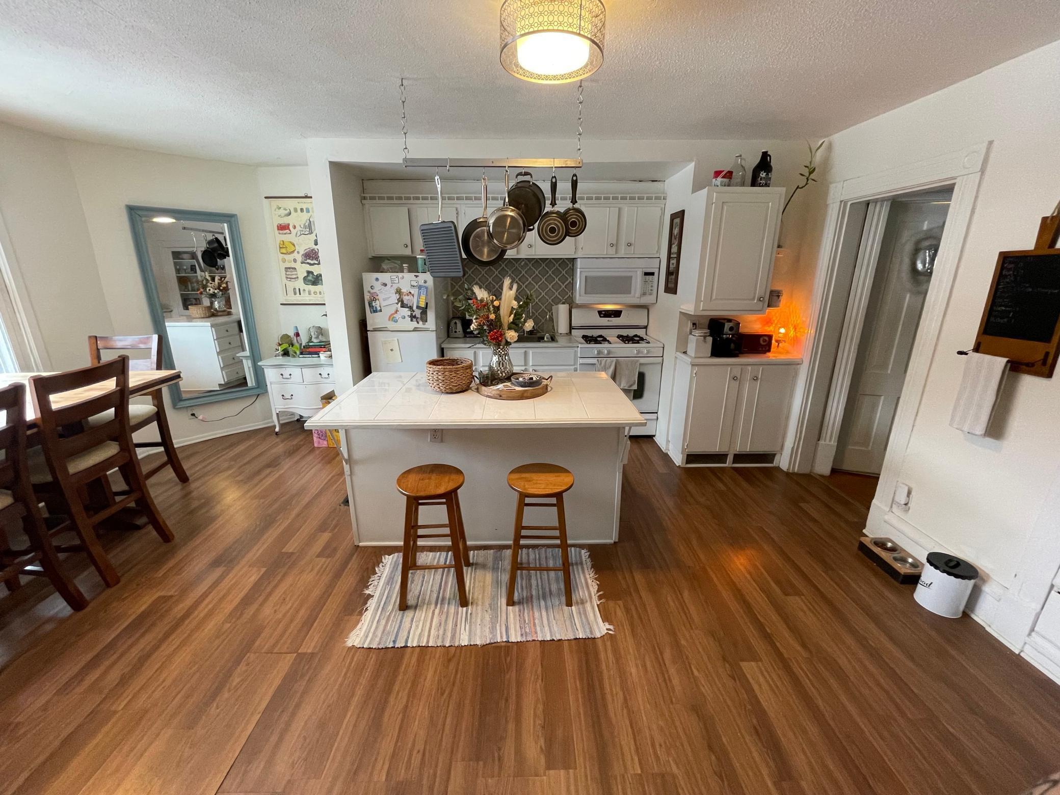 Extra large kitchen with center island, would be perfect for owner occupant