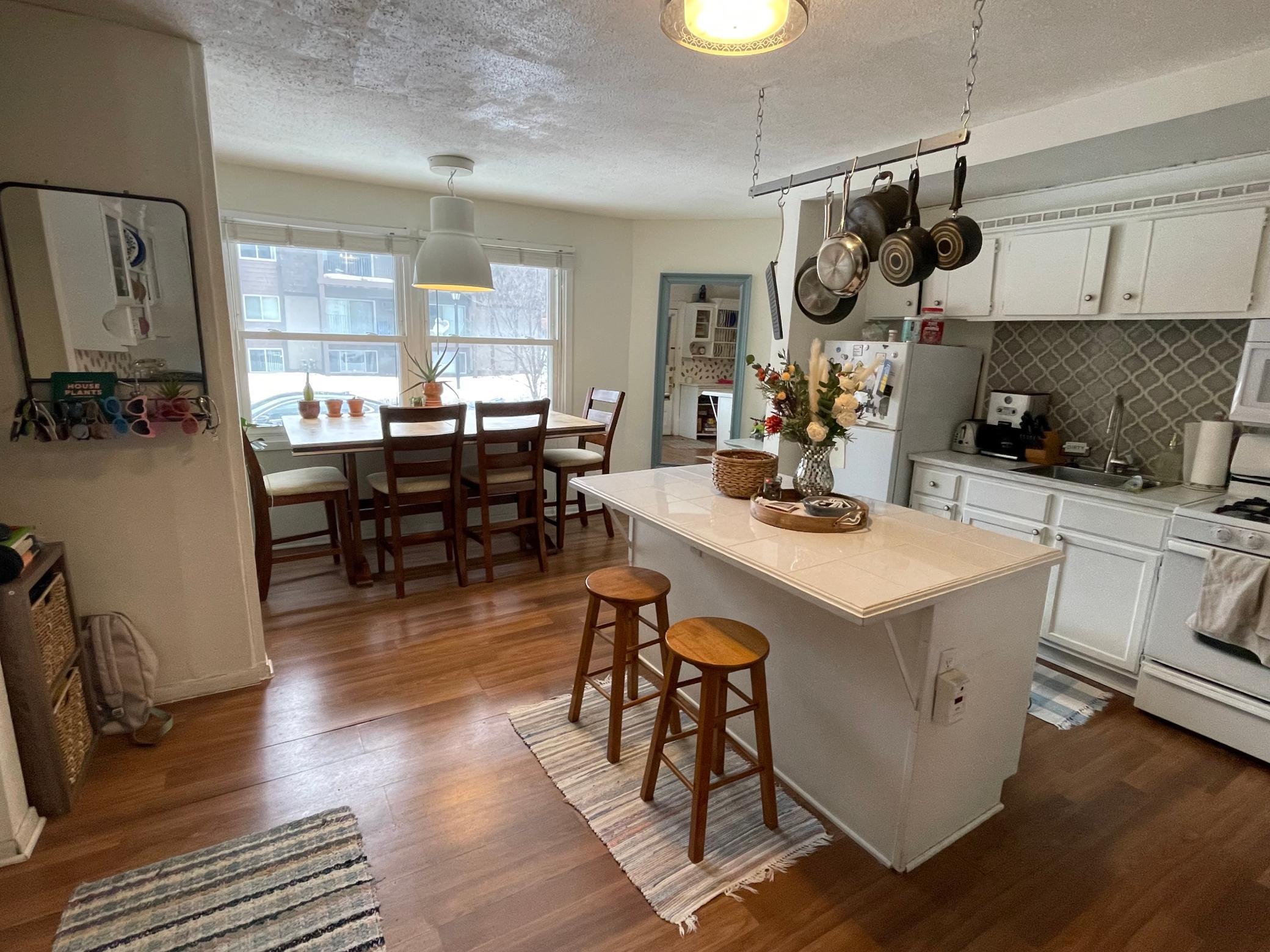 Main floor 1 bedroom unit kitchen and dining space