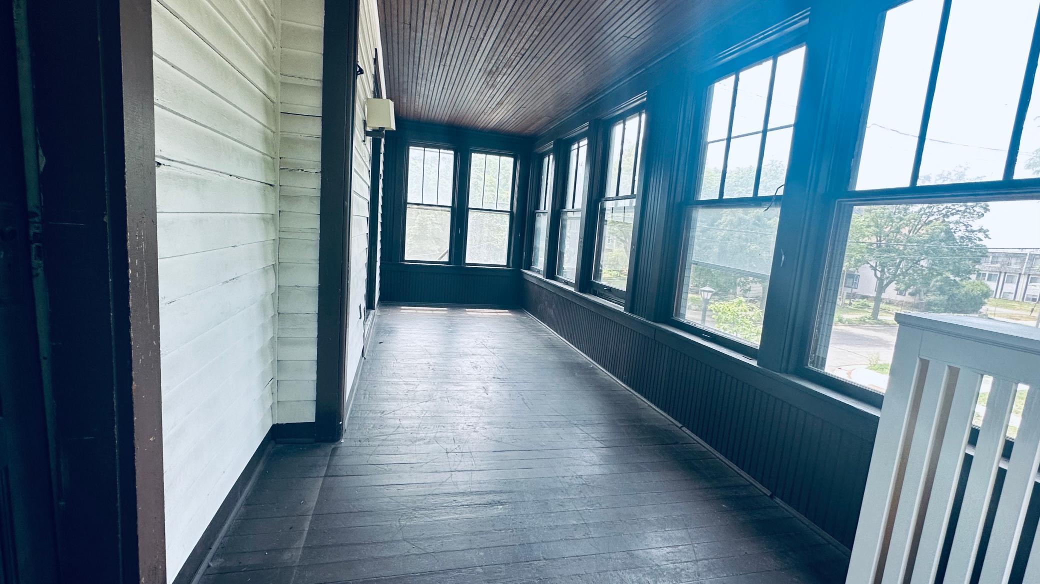 View of sunroom, flooded with natural light