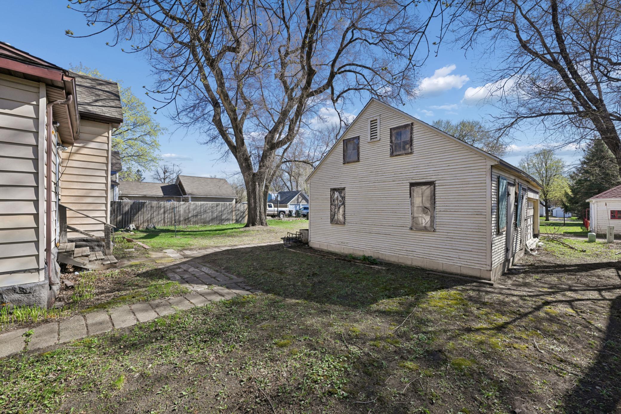 The home includes a rare 3-car detached garage.