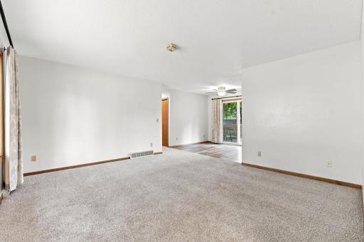 Living room opens to dining room.