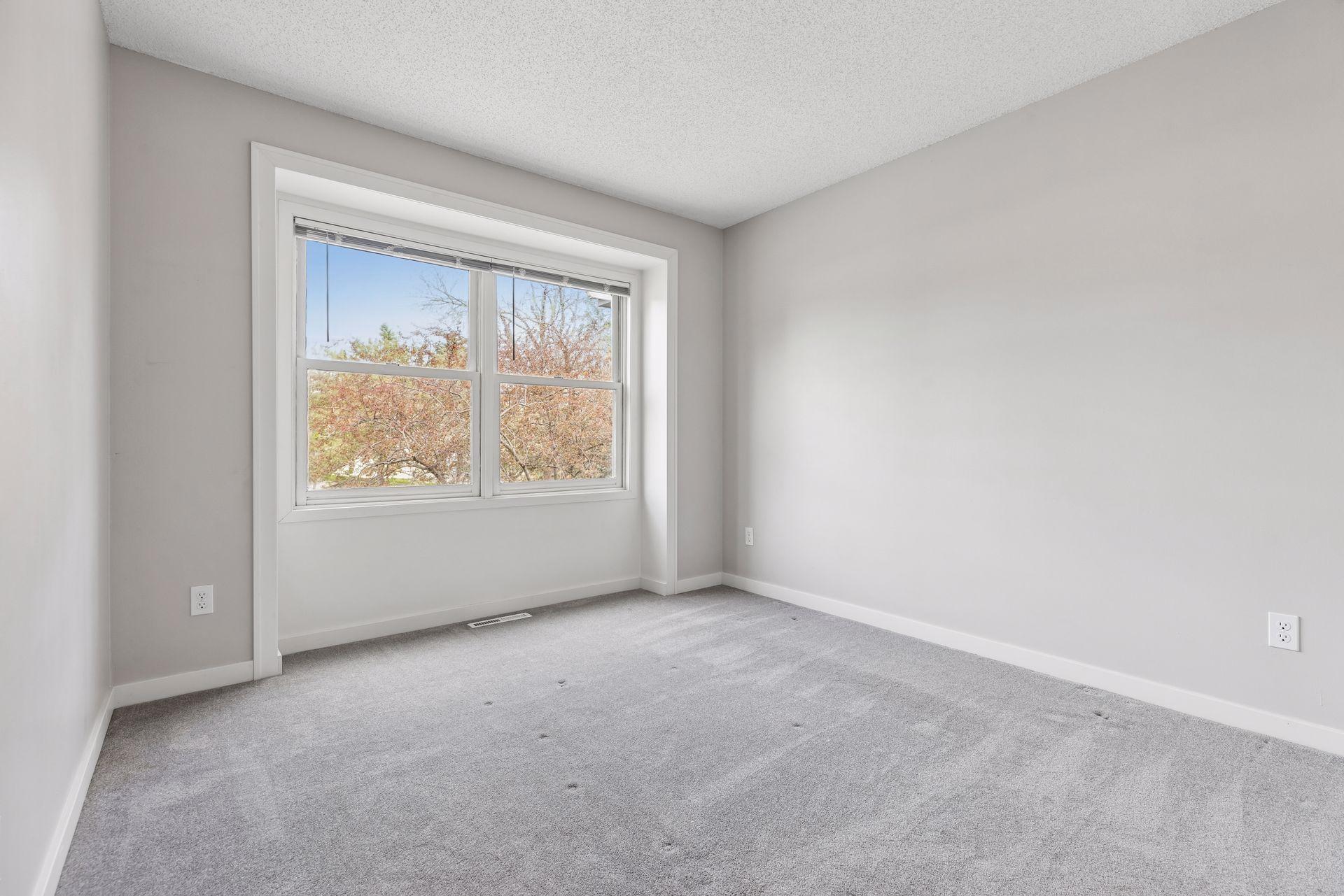 2nd bedroom with tree top views