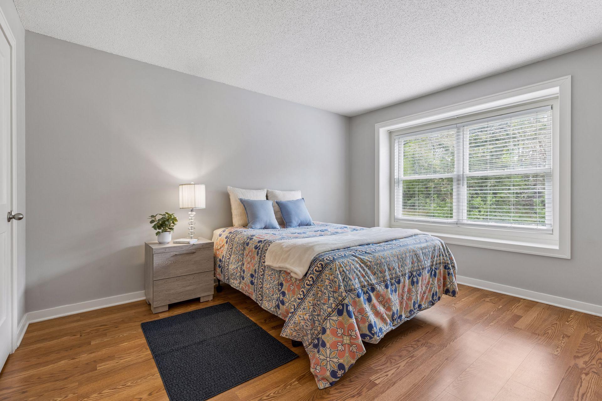 Primary bedroom with ensuite over looks the private yard year round