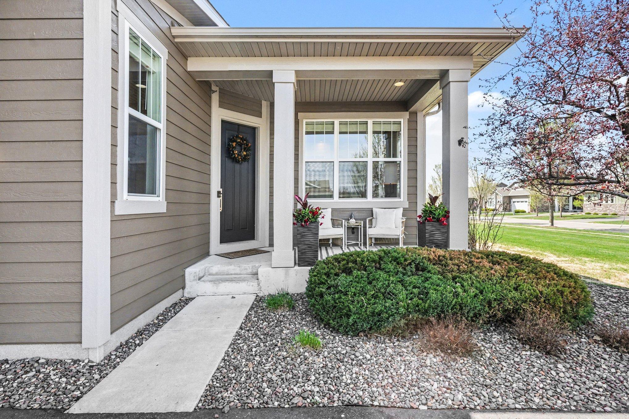 The second you walk up you will be ready for a cup of coffee on this front porch!