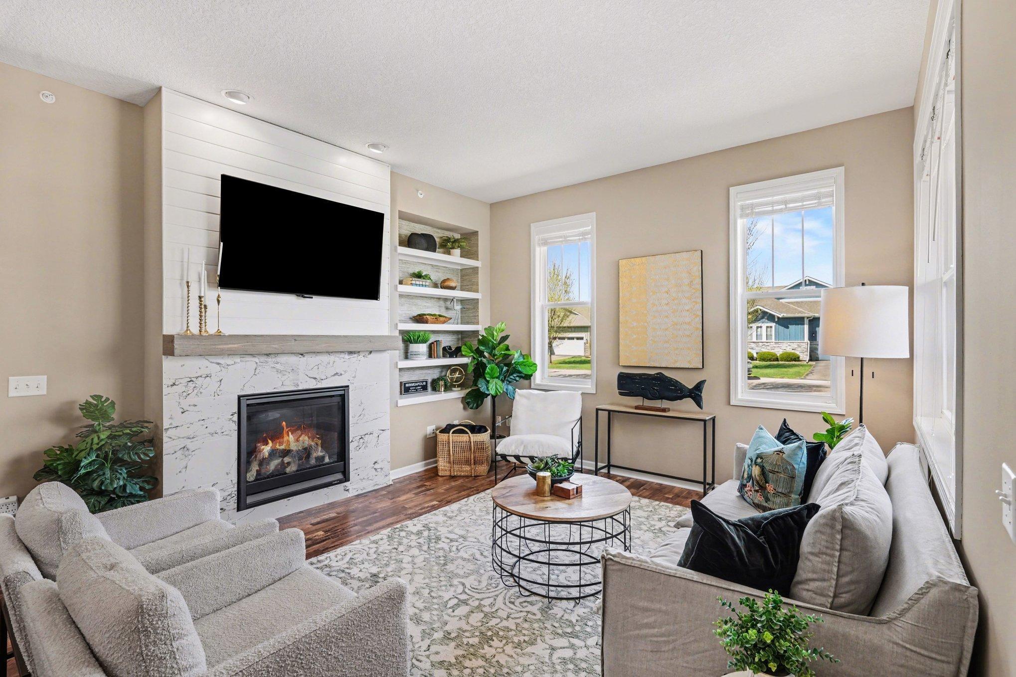This updated fireplace wall and shelving bring so much class to this home!