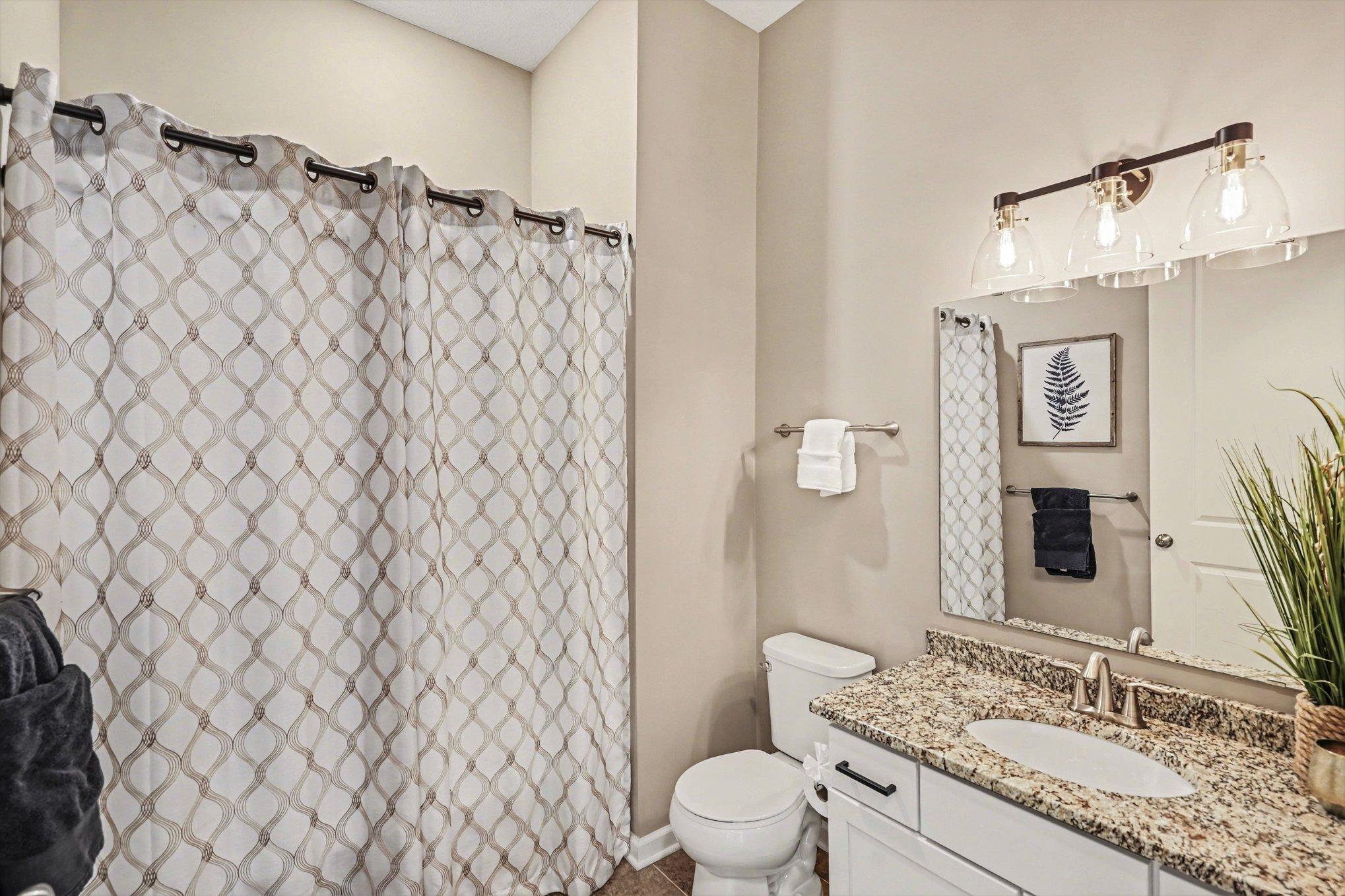 Guest bathroom with granite countertops!