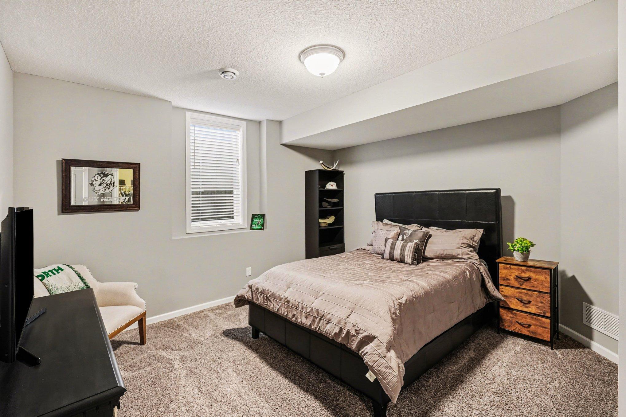 Bedroom #3 is the lower-level bedroom with so much space!