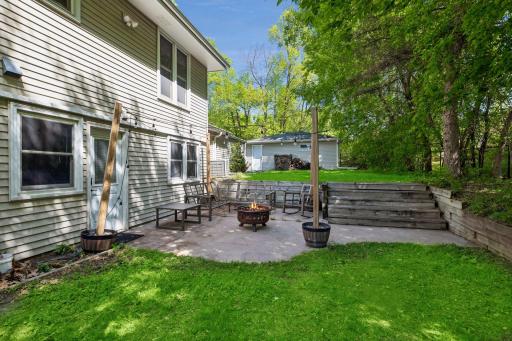Entertain by the fire on this spacious back patio