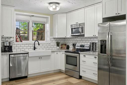 Open Kitchen with Stainless Steel Appliances