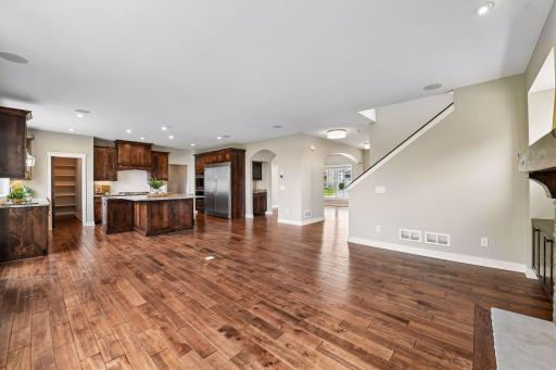 Open concept design connects the kitchen and great room while the oversized windows capture views toward Wassermann Lake.