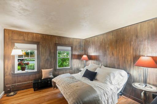 Amazing primary bedroom with designer-painter textured walls.