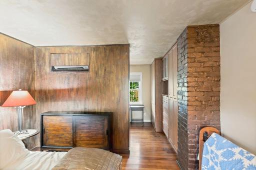 Step from the bedroom into a beautiful, spacious custom walk-in closet