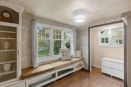 Window seat tips up for convenient extra storage