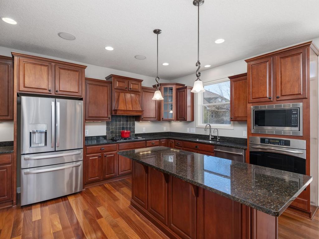 Much appreciated is the center island with breakfast bar seating!