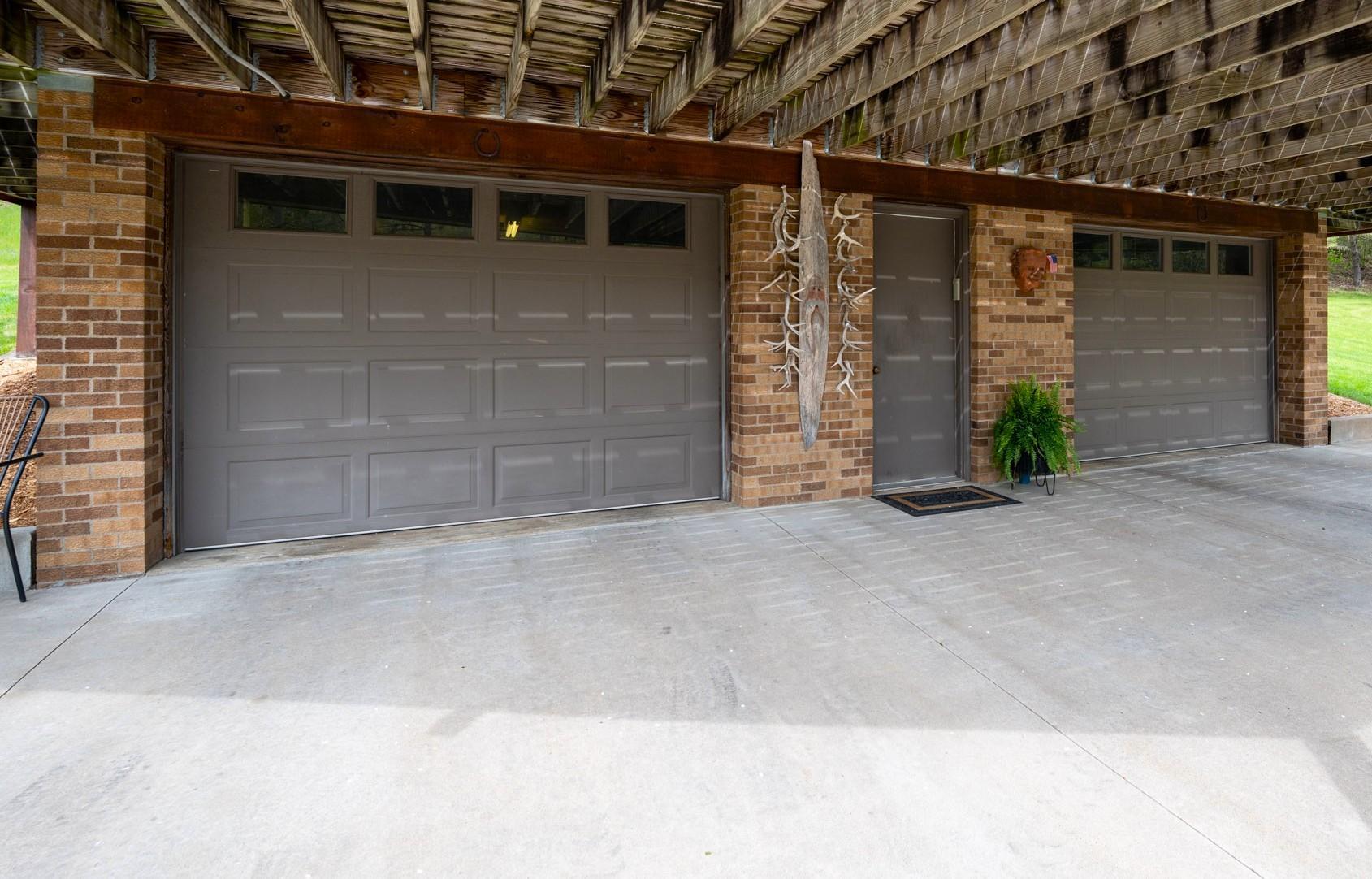 Large Cement pad outside of garage and under the deck.