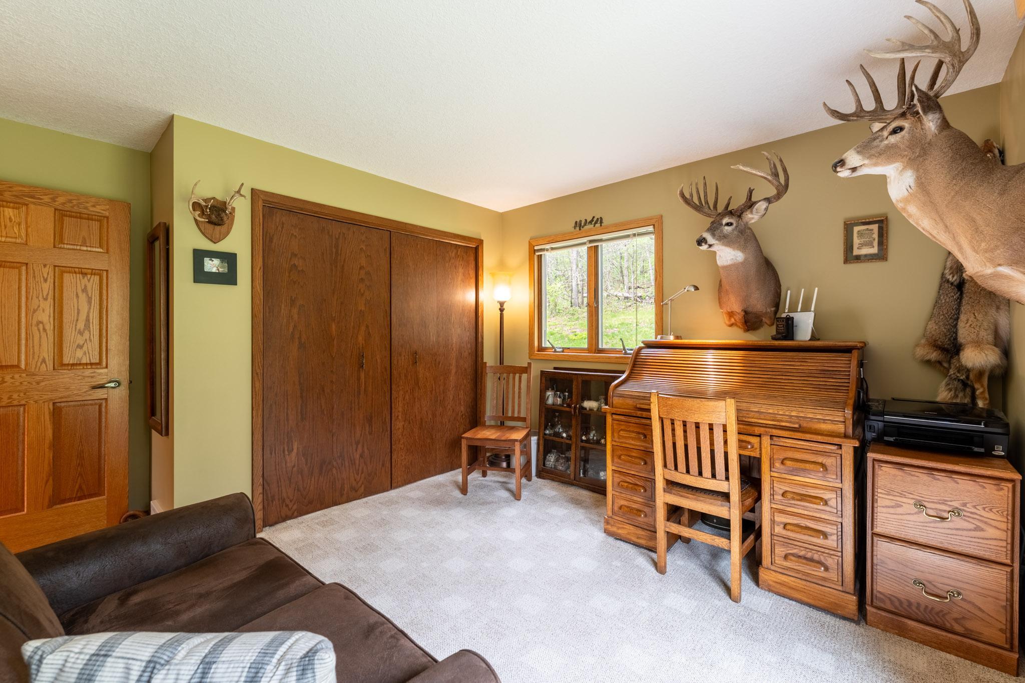 Main level bedroom, currently being used as an office.