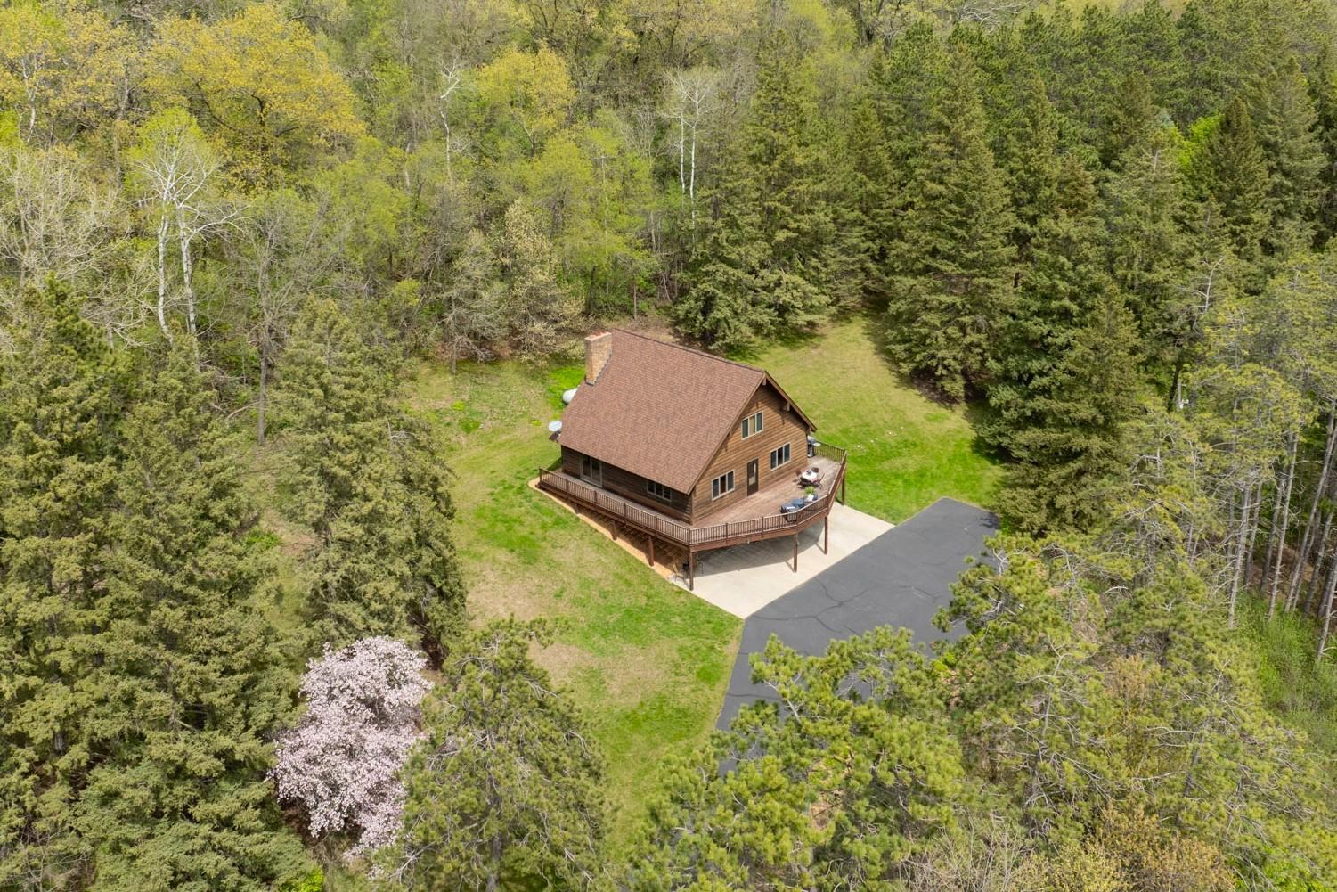 This setting is ideal for those seeking a quiet country homestead, a nature escape, or a prime hunting property.