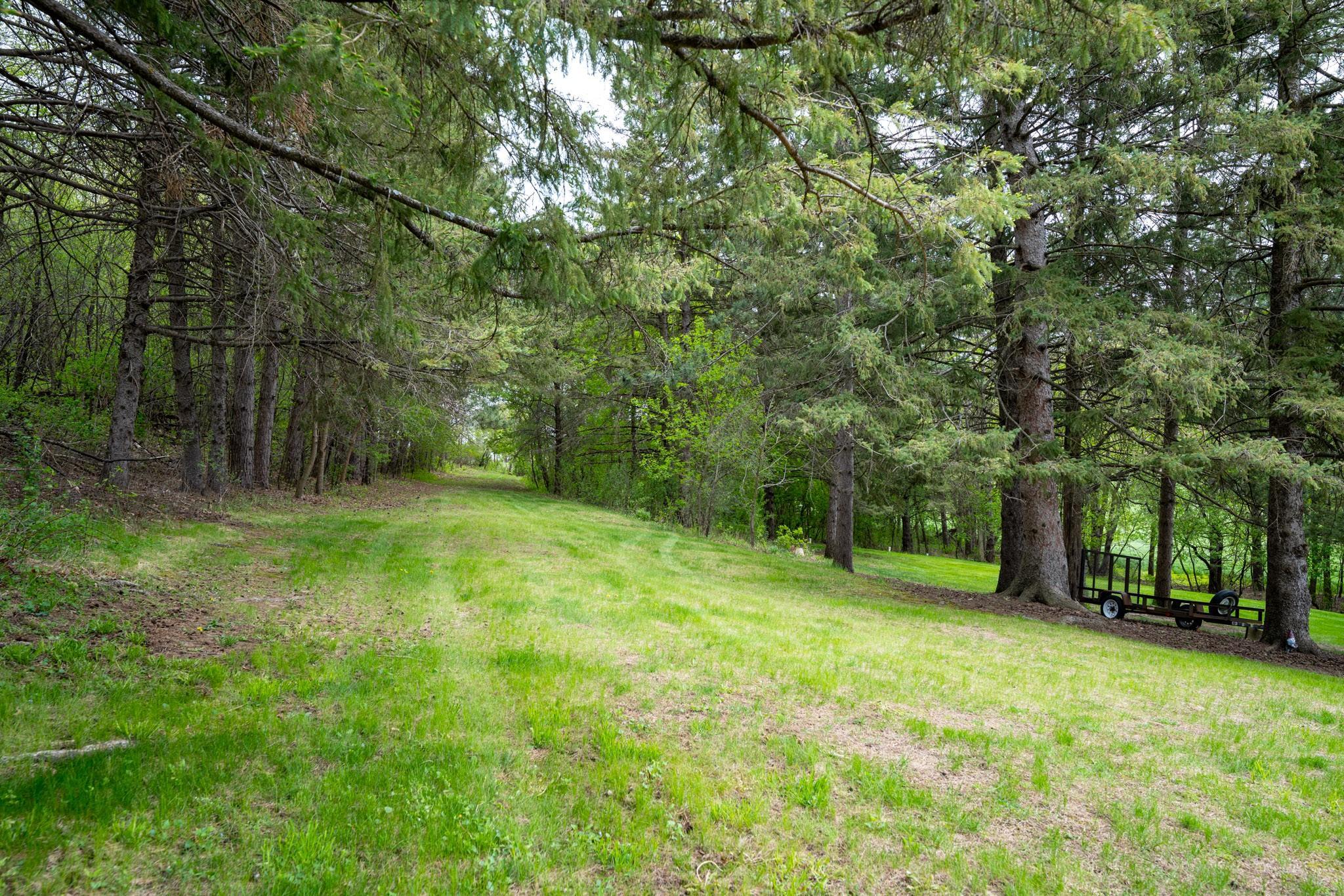 The land expands on all sides of the home. Plenty of space to wonder with nature!