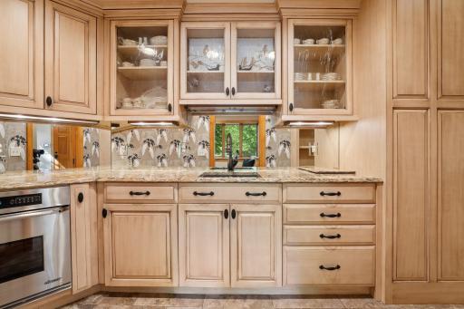 Custom butlerâs pantry designed with exceptional storage, workspace, and functionality.