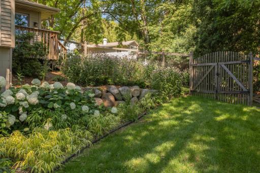 Native, drought resistant plantings fill the yard, which conserve water and lower needed maintenance.