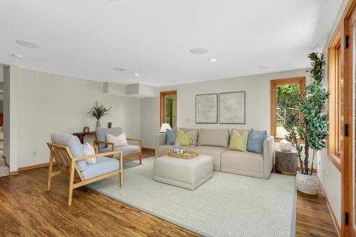 Giant, walkout sunroom is actually the 5th bedroom, and includes 3 closets.