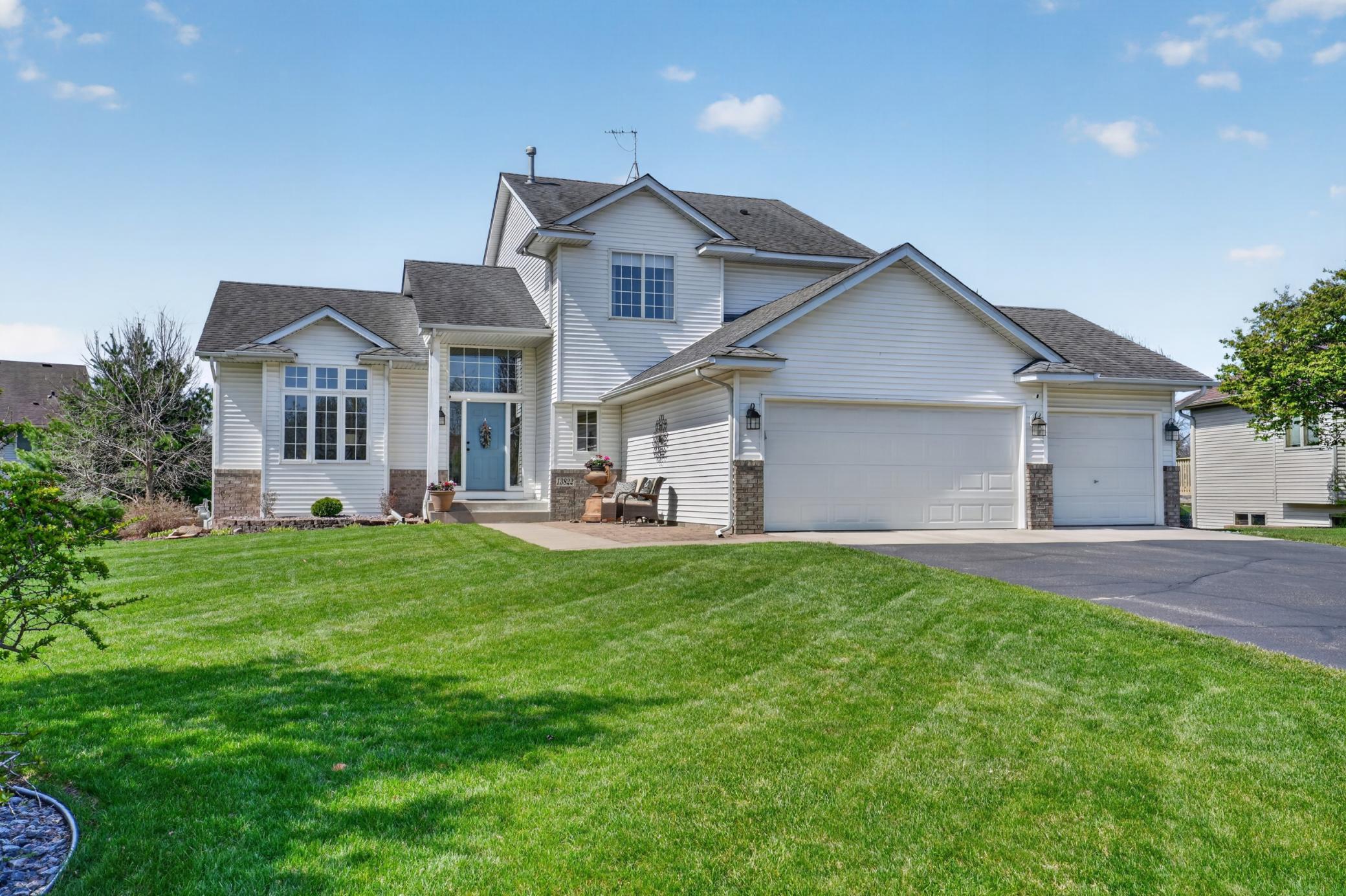 Welcome to 13822 Evergreen and its attractive front elevation with mature landscaping and attached 3-car garage