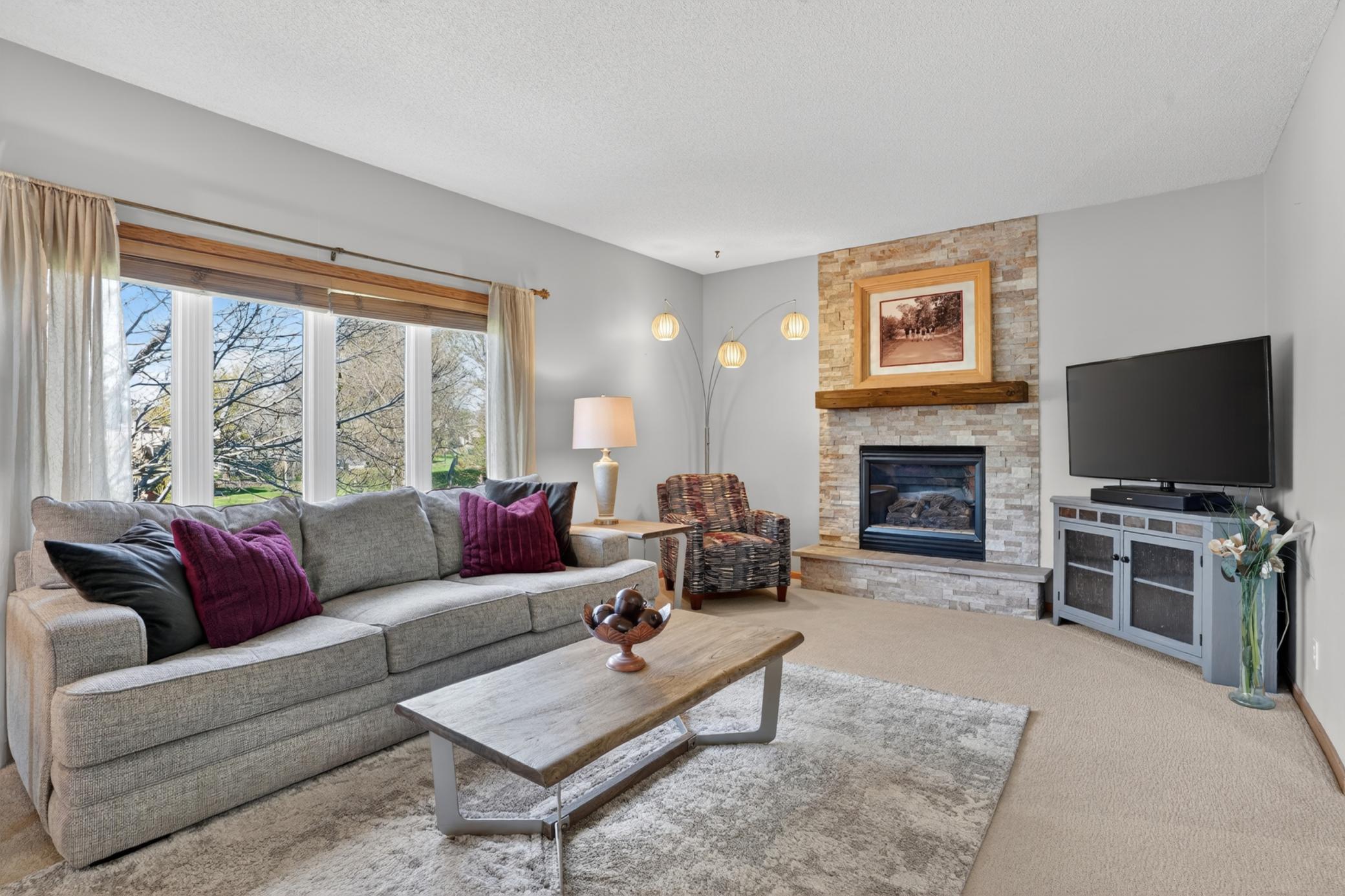 Spacious family room with fireplace and comfortable main-level gathering space
