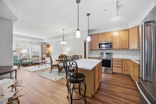 A view of the kitchen, dining area and living room. Wonderful updates throughout!! This is the one you've been waiting for!