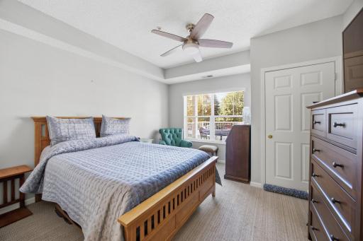The bedroom is spacious with a nice window, ceiling fan, gorgeous carpeting and a beautiful neutral pain color too.
