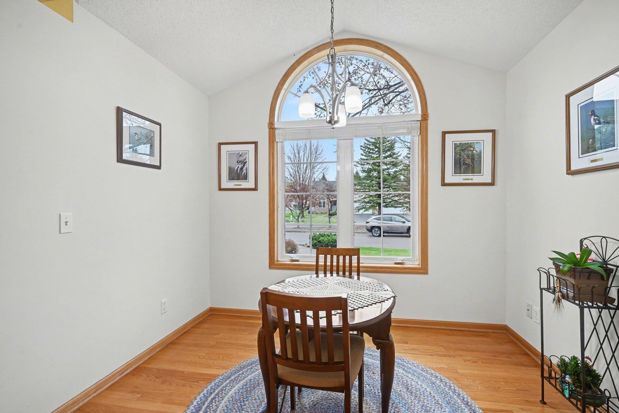 Informal dining space in the east facing oversized kitchen window.