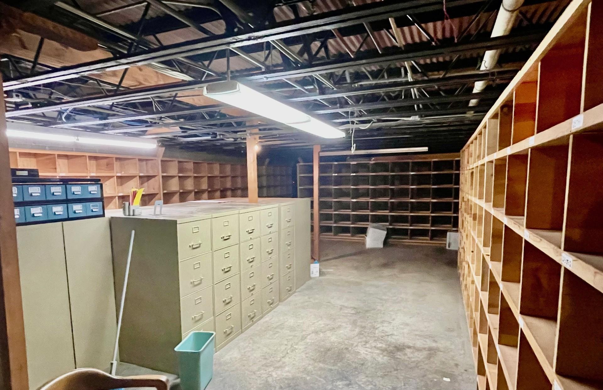 Lower level storage cabinets and shelving