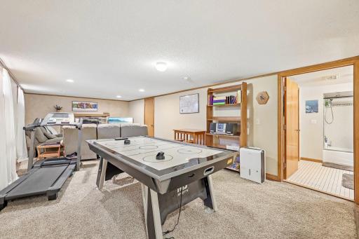 This room has a large throw rug, not fully carpeted