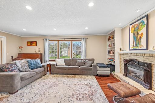 Hardwood floors throughout this living room ...
