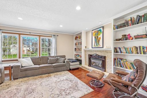 Enjoy the charm of this era with built-in bookcases surrounding the fireplace.