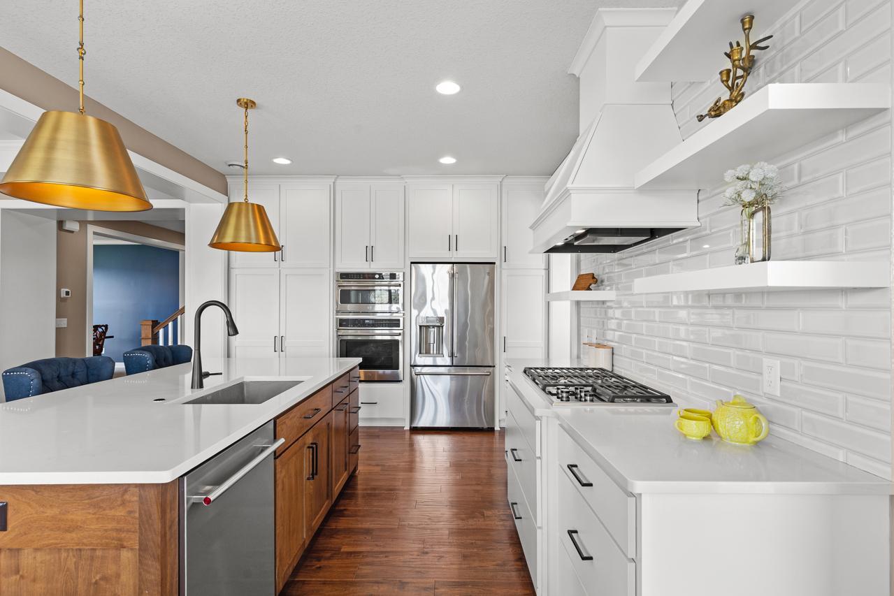 Appliances built into cabinets, in addition to a gas stovetop.
