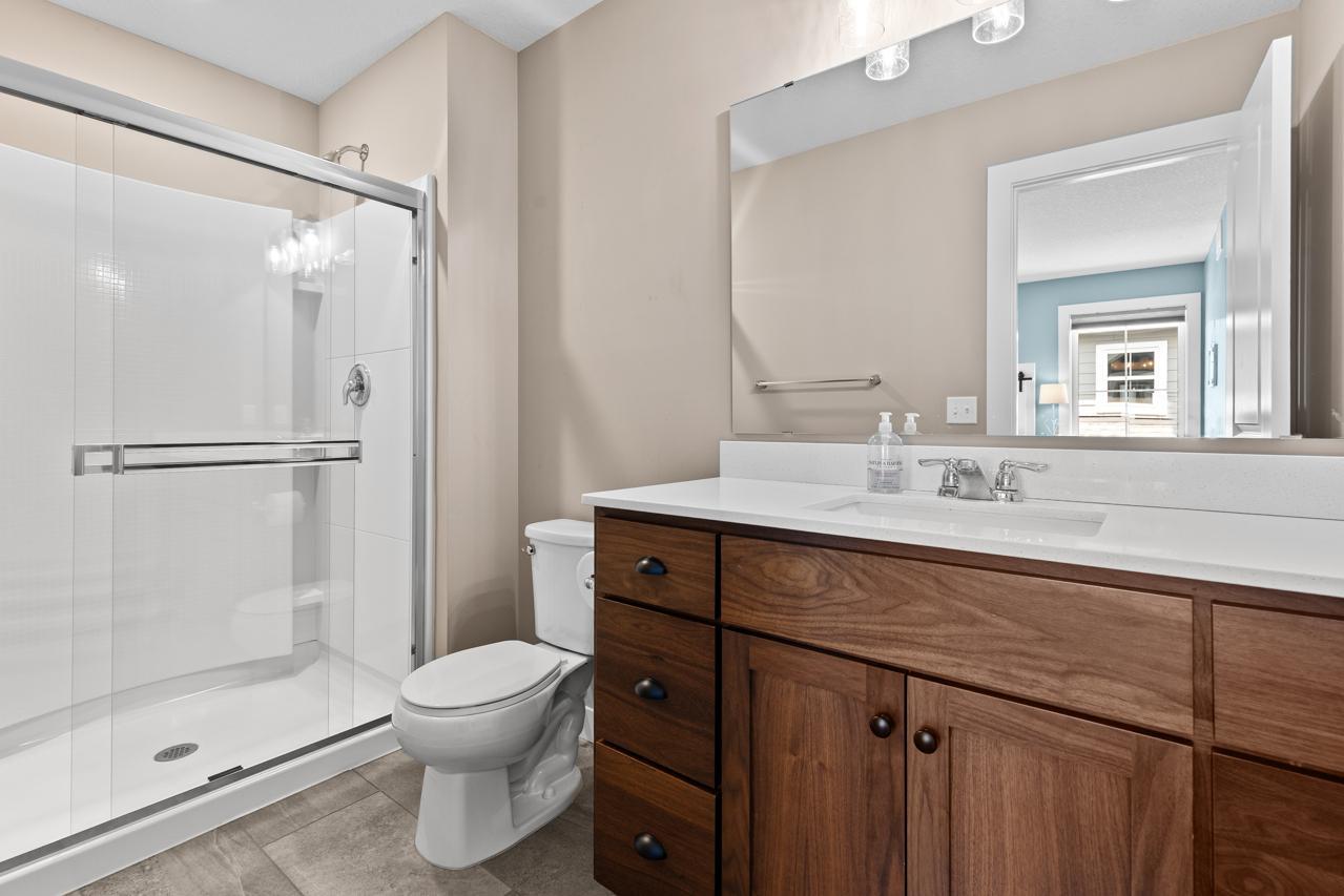 Upper level 3/4 bath connected to bedroom