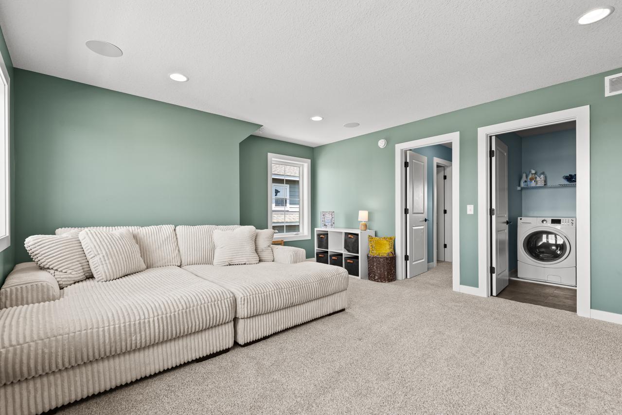Flex room on the upper level leads into the laundry room.
