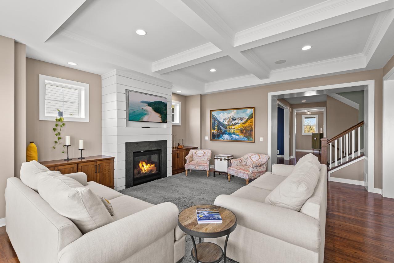 Cozy main floor family room with a gas fireplace.