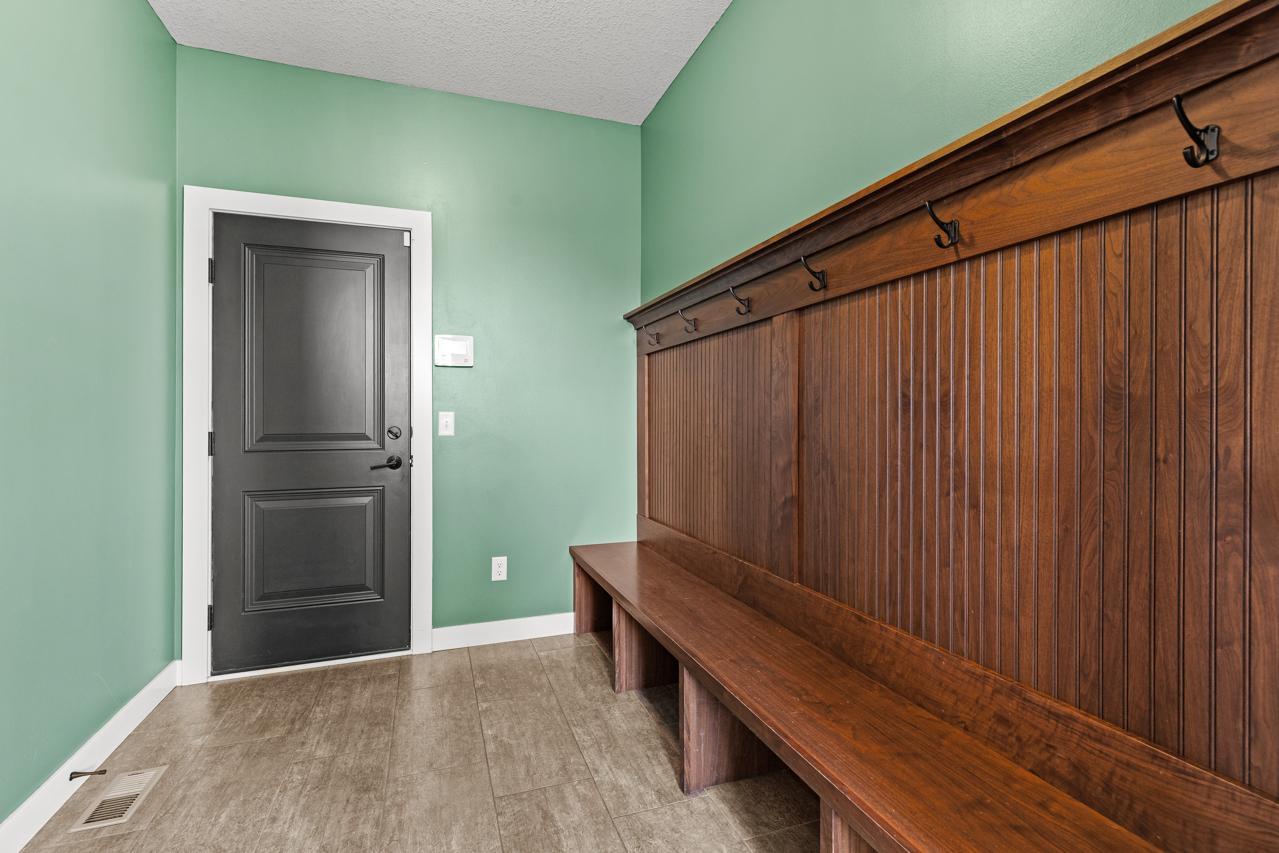 Large mudroom with quick access from garage.